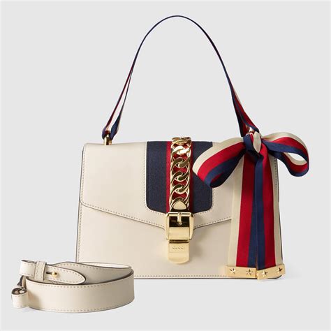 gucci perce|white gucci handbag.